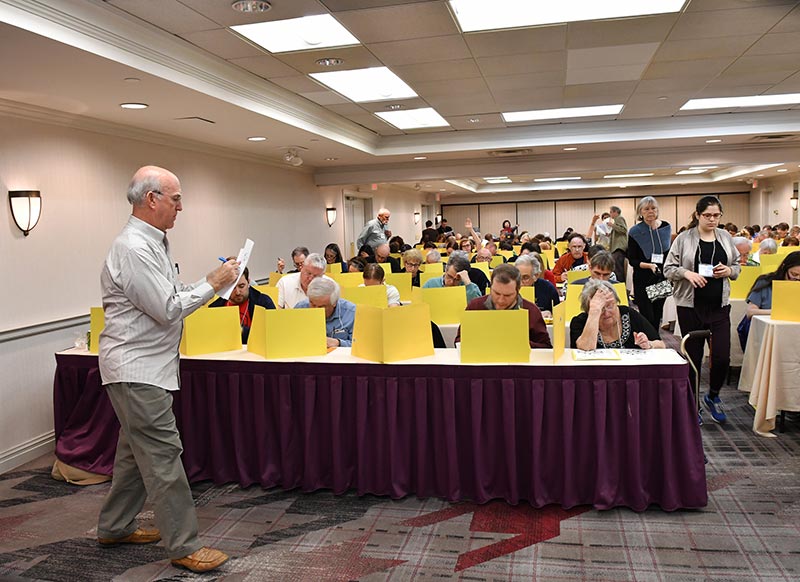 Vic Fleming works the downstairs ballroom at 2018 ACPT